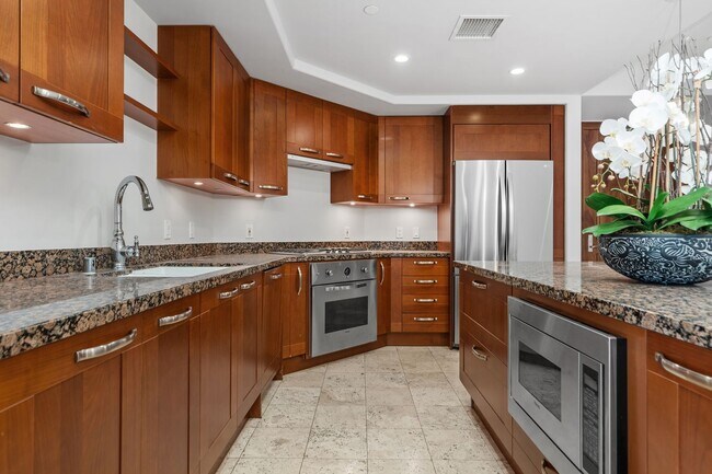 Building Photo - Spacious Irvine Financial District Condo with Full Service Amenities