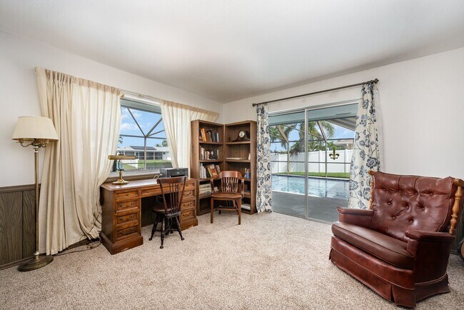 Building Photo - Enjoy the pool or fish/kayak/boat from the...