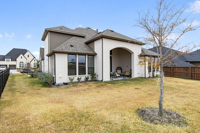 Building Photo - Stunning 4-Bedroom Luxury Residence with Bonus Office in the Prestigious Walsh Community LIKE NEW!