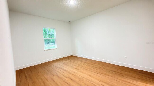 Building Photo - 7250 N Freeport Cir