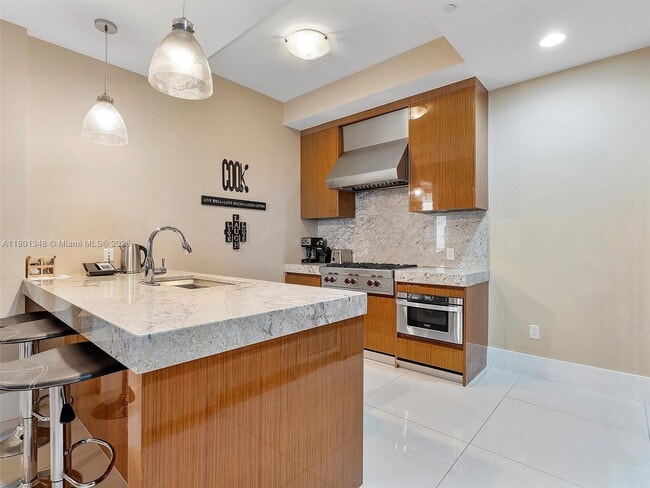 Building Photo - 9705 Collins Ave