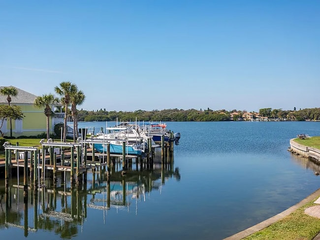 Building Photo - Stunning 2/1 available now at Waterside at Coqunia Key!