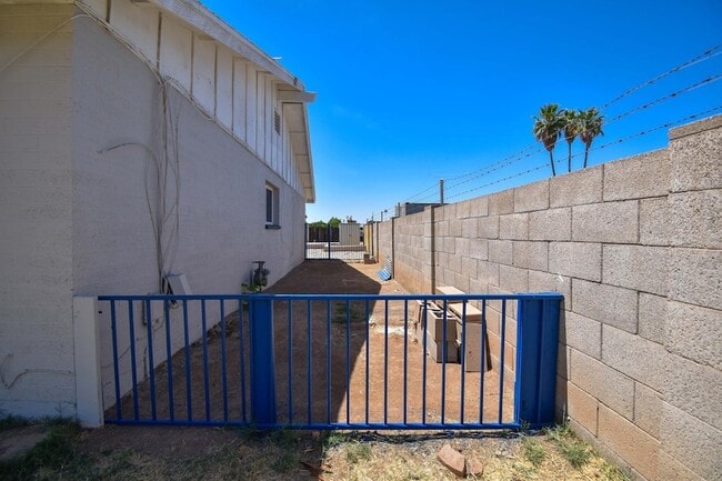 Building Photo - 6819 N 64th Ave