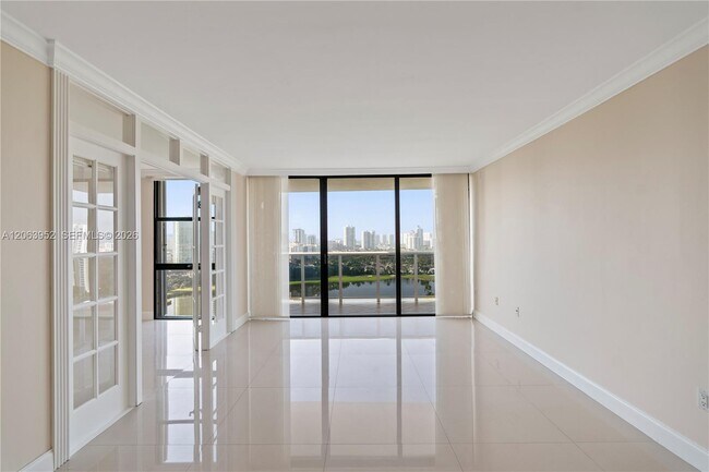 Building Photo - 3675 N Country Club Dr