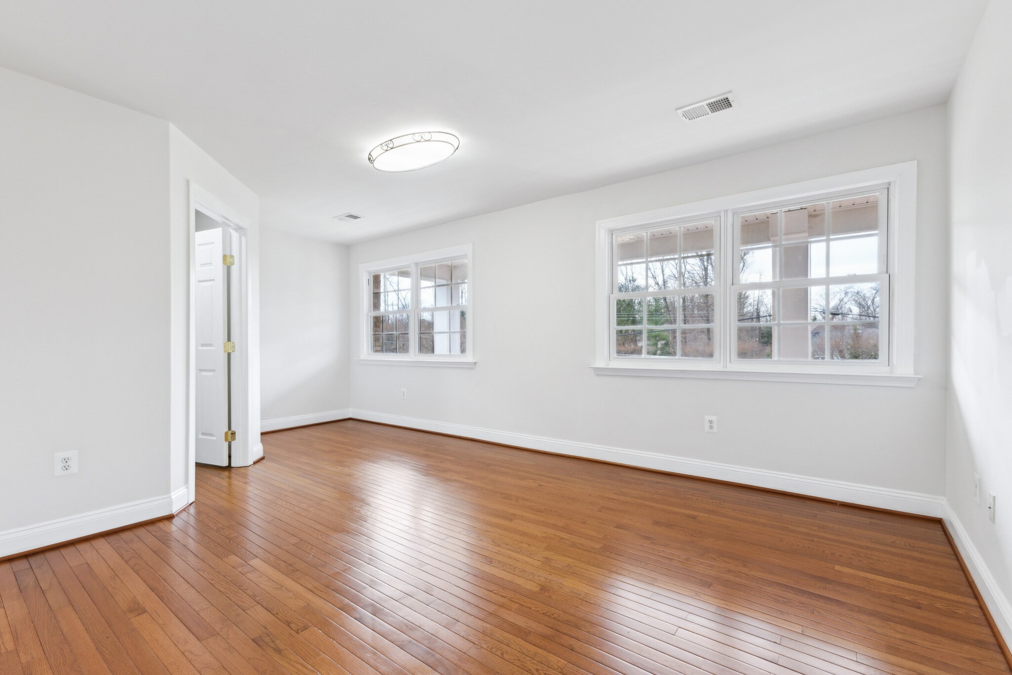 Bedroom 2 on front of home - 10828 Miller Rd