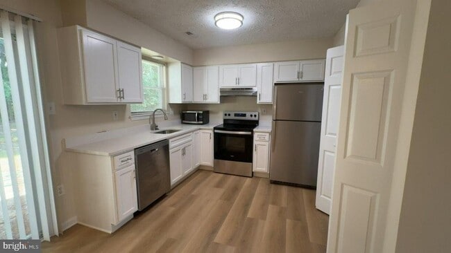 Building Photo - 2431 W Rosecroft Village Cir