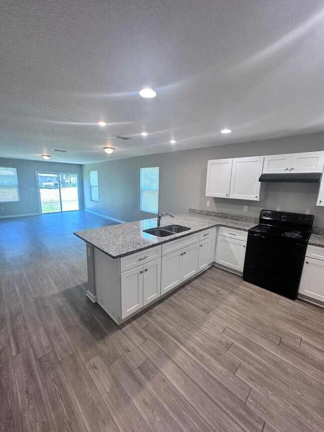 Building Photo - *** TWO WEEKS FREE ***  Gorgeous 4-Bedroom Home with Granite Counters & 2-Car Garage