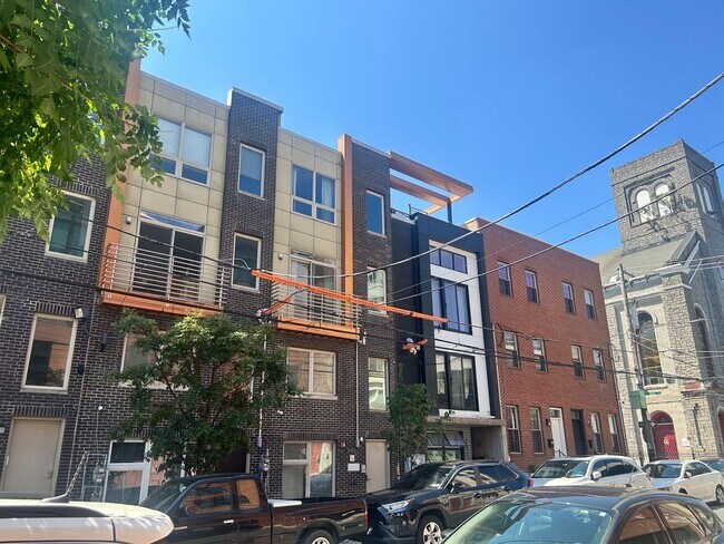 Building Photo - Beautiful Condo with Amazing Roof Top Deck
