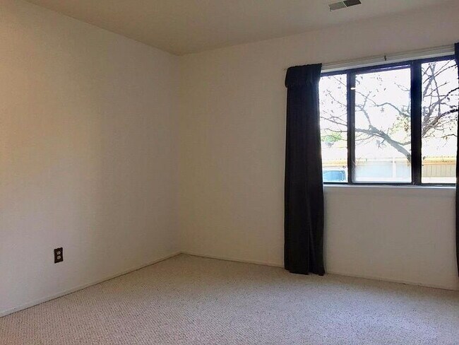 Building Photo - "Glamorous 2-Bedroom Condo with Fireplace ...