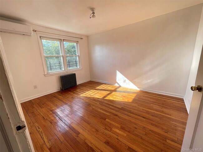 Building Photo - 23-16 97th St