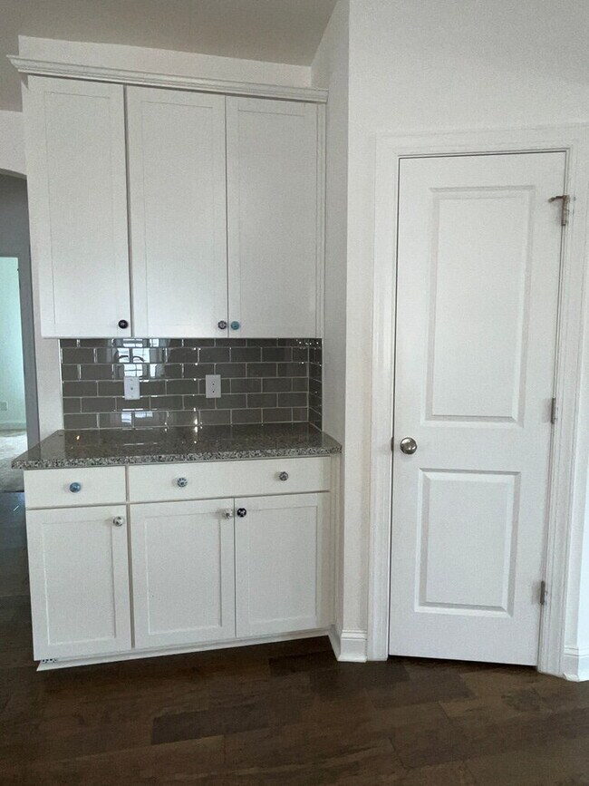 Building Photo - "Spacious 4-Bed Oasis with Stunning Lake V...