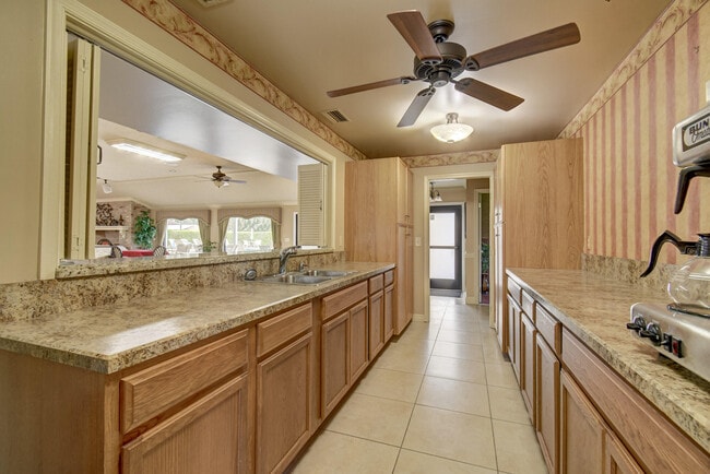 Building Photo - 9780 Parkinsonia Tree Trail