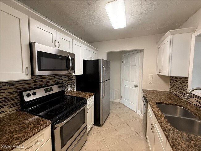 Building Photo - 6675 Fiesta Way