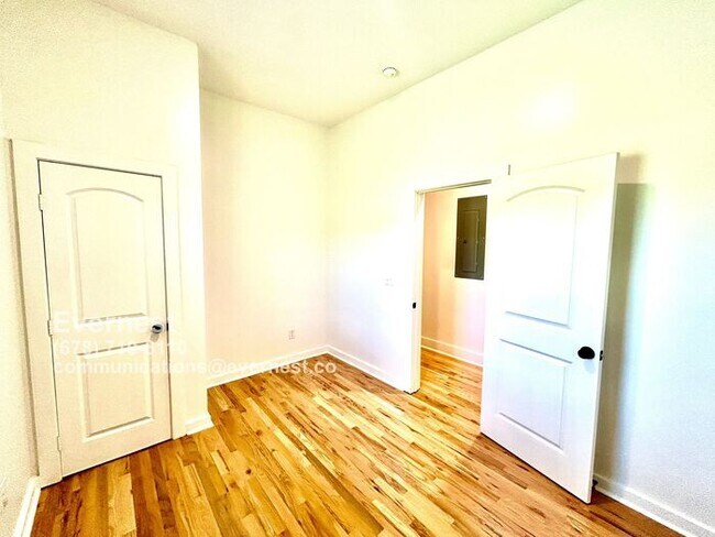 Building Photo - Spacious 4-Bedroom Home with Front Porch a...