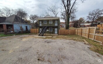 Building Photo - Charming Apartment Unit