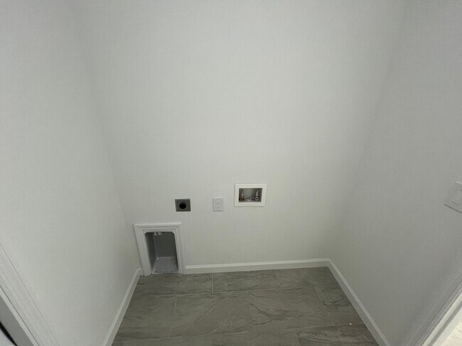 Building Photo - MODERN BRAND NEW RETREAT IN LEHIGH ACRES!