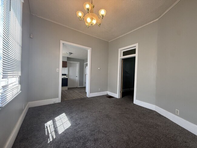 Building Photo - 2 Bed House w/ Ramp Access and Fenced in Back Yard + Walk In Shower