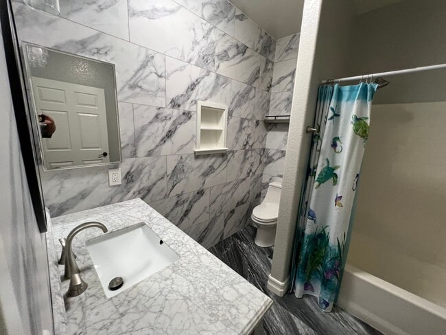 Building Photo - Upgraded Single Story First Floor Condo in Gated Community at Popular Madison Park Villas