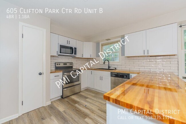 Building Photo - Spacious 1800 SF 4 bedroom, 1.5 bath raise...