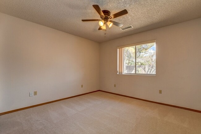 Building Photo - Nice three bedroom two bath home in PV!