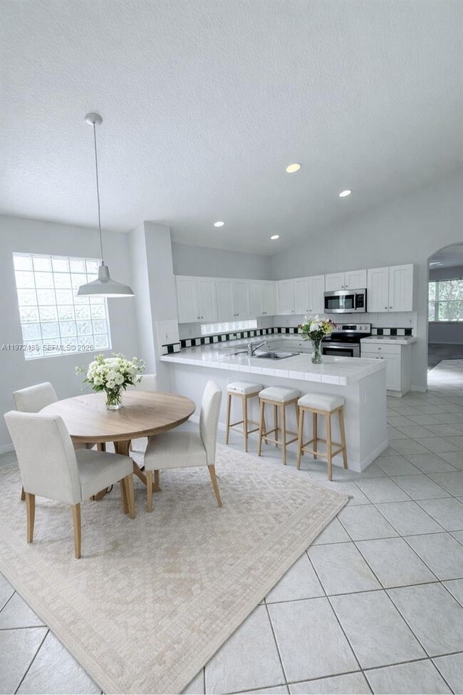 Building Photo - 5089 NW 121st Dr