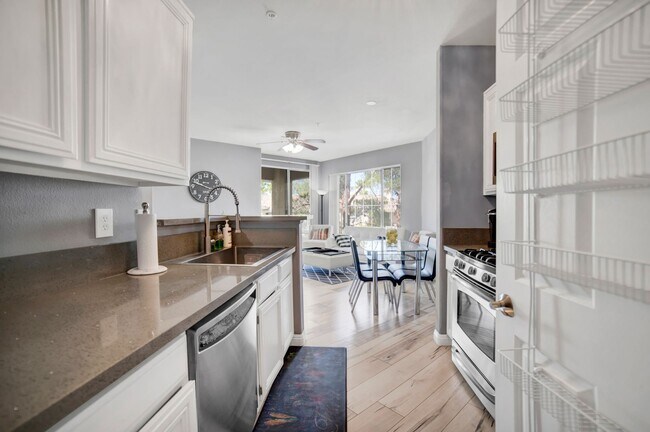 Building Photo - NEWLY RENOVATED AND FULLY FURNISHED CONDO ...