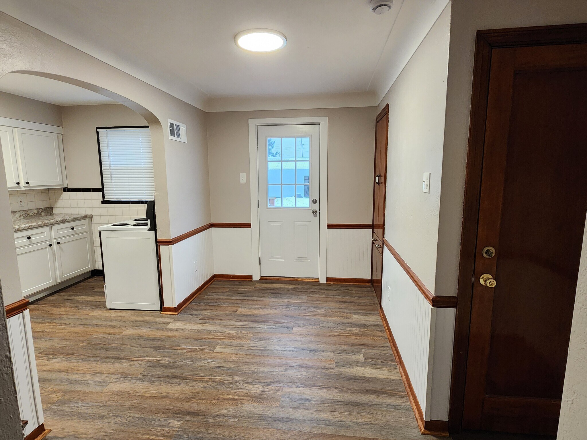 Dining room with basement door to the right - 13131 East Ln