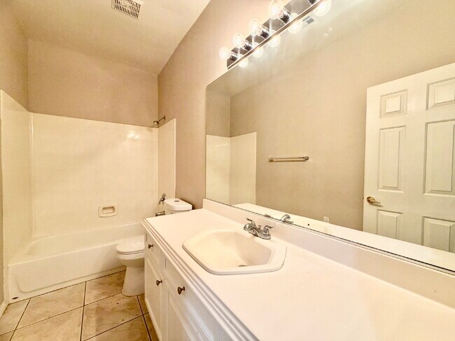 Building Photo - GATED SUMMERLIN HOME | 5 BEDROOM + DOWNSTAIRS DEN | 3-CAR GARAGE