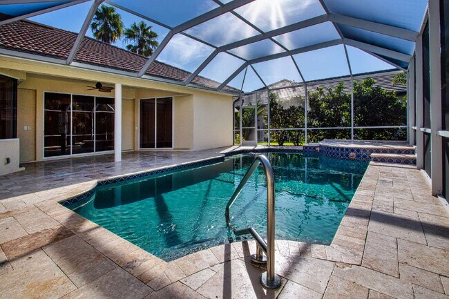 Building Photo - Rarely available executive home in The Hammocks is ready to rent on a long-term lease.