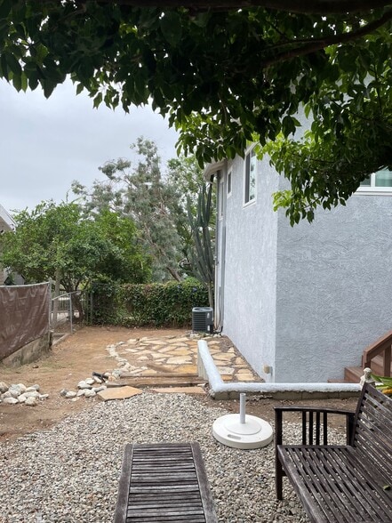 backyard looking west (new fence coming soon) - 1038 Glen Arbor Ave