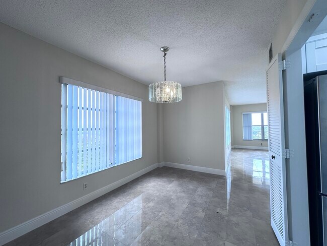 Building Photo - 10777 W Sample Rd