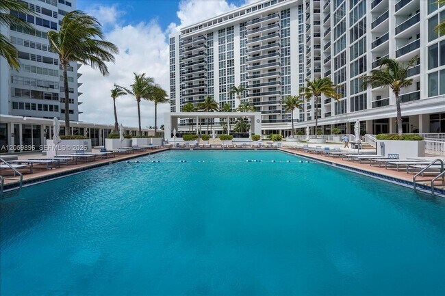 Building Photo - 10275 Collins Ave