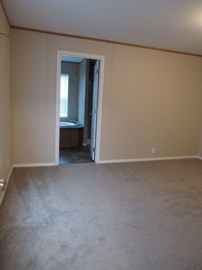 Building Photo - 3 Bed 2 bath Mills Mobile Home on Beautiful Treed Lot