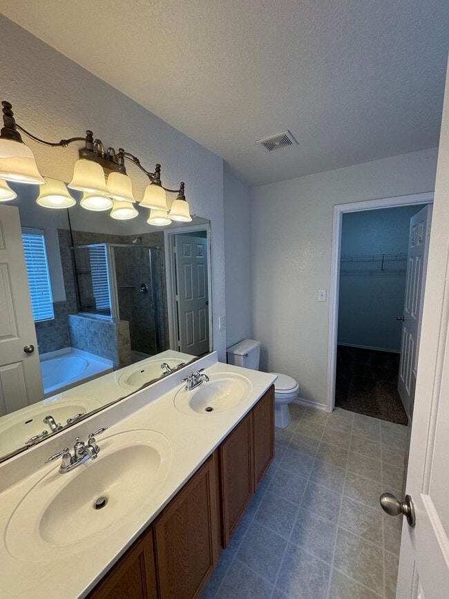 Building Photo - CUTE 2-STORY NESTLED ON A CUL-DE-SAC FEATURING AN ISLAND KITCHEN WITH STOVE/RANGE, DISHWASHER, MI...