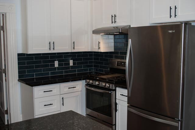 gas stove, large bottom freezer fridge - 2730 F St