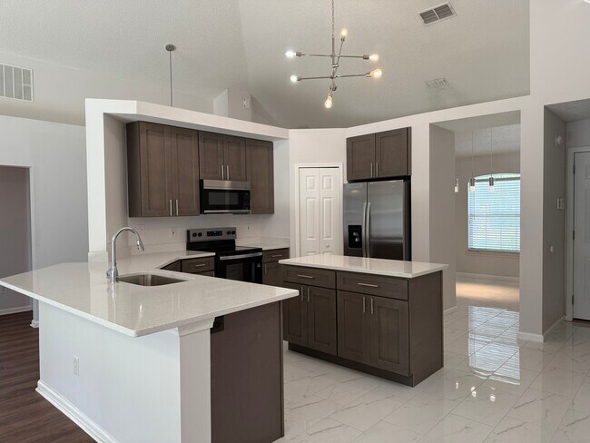 Building Photo - 5458 Hidden Gardens Dr