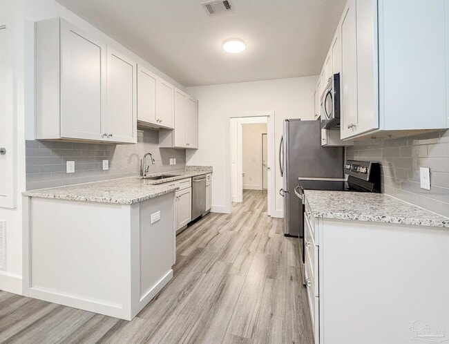 Building Photo - 6214 Ferguson Dr