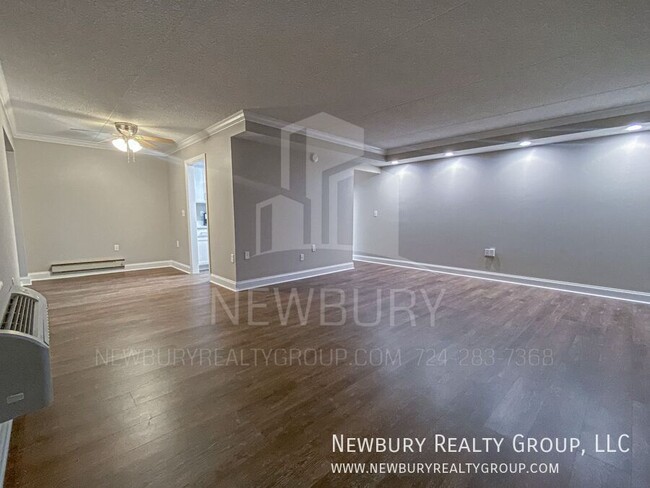 Building Photo - Luxury 1-Bedroom Penthouse with Modern Ren...