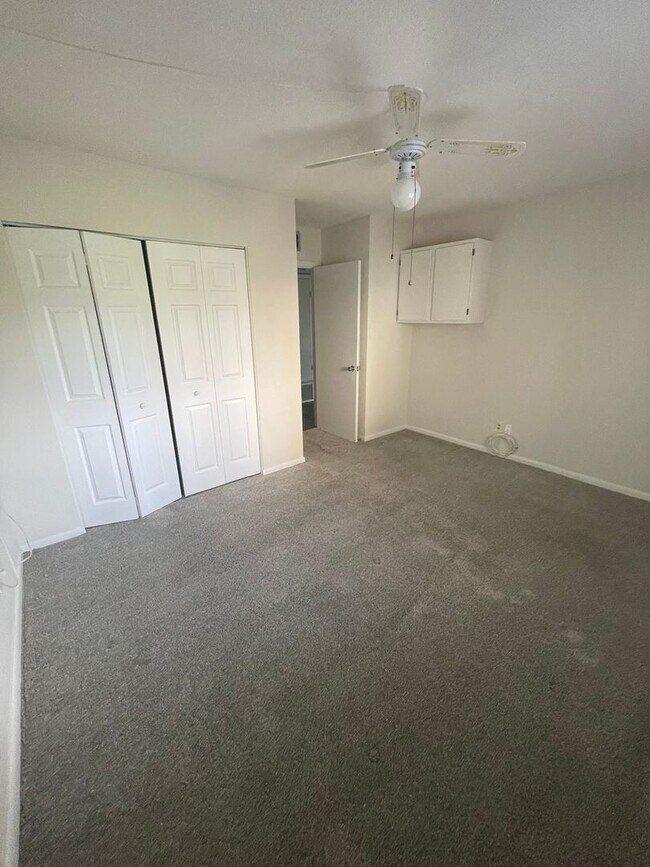 Building Photo - 55+ Charming first-floor condo nestled in the serene Fairways 3 Condominiums