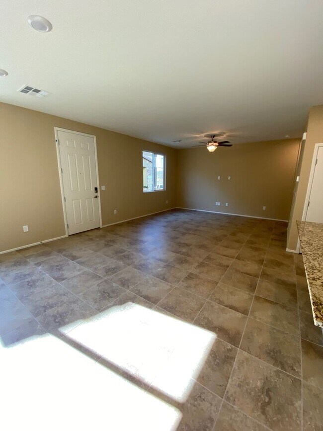 Building Photo - Spacious Townhouse with Loft & Rare 3-Car Garage!
