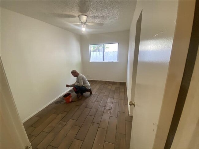 Building Photo - Large 2/2 duplex with a 2 car carport