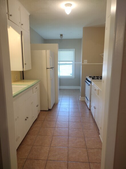 Building Photo - 6113 Avenue Q 1/2
