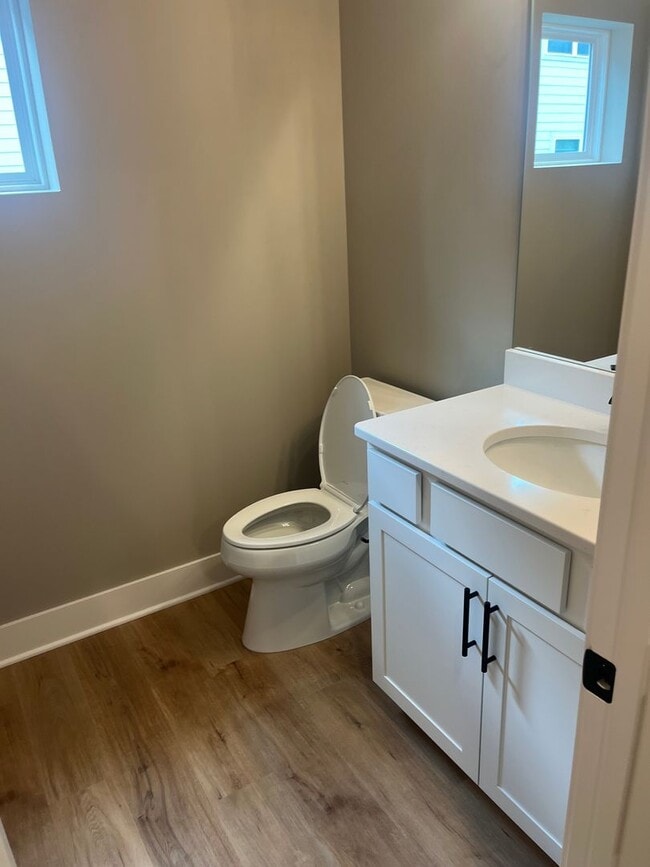 Building Photo - New Construction, 2 bed, 3 bath Row Home, with 2 car garage, fireplace, and rooftop deck!