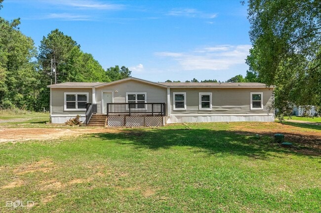 Building Photo - 4BD/2BA home with fenced back yard.