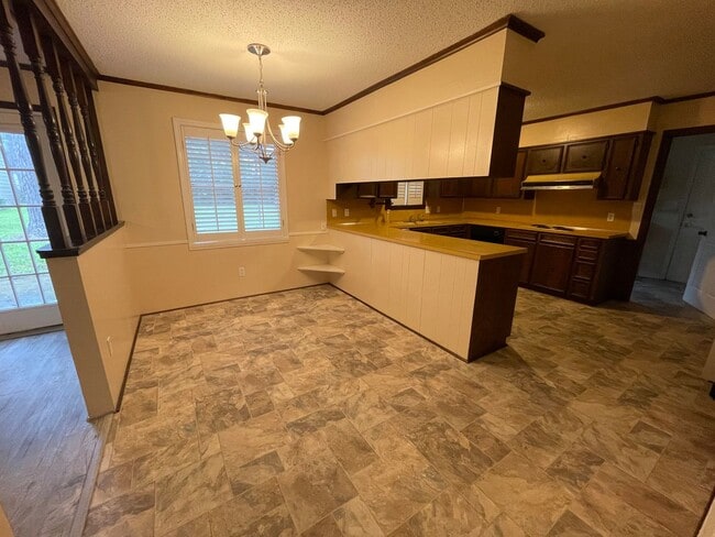 Building Photo - Lovely Two-Story Brick Home Located In "Western Hills" Off Pines Road