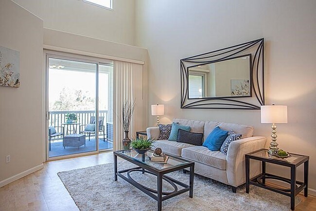 Living Room with Balcony View - 903 Sunrose Terrace