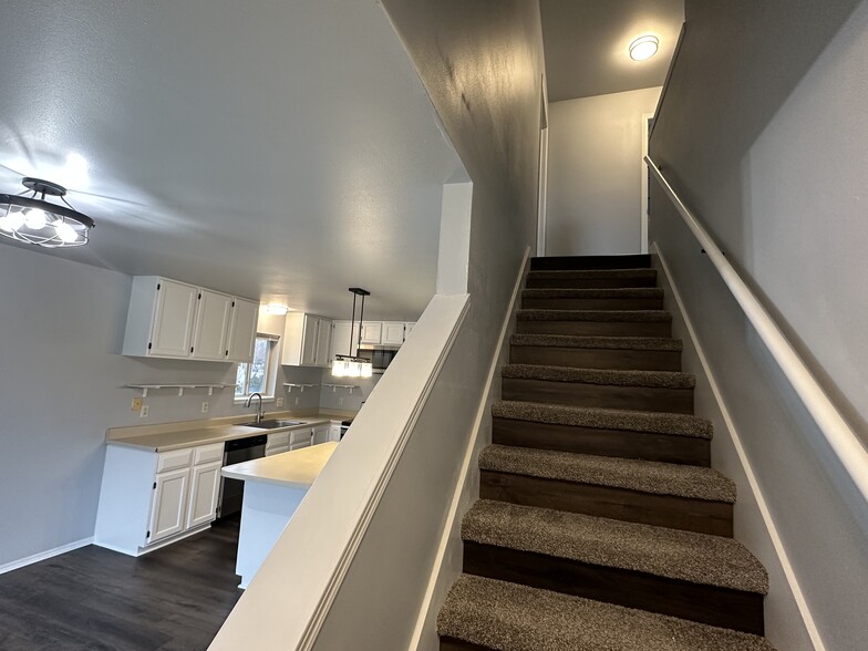 Stairs to second level from kitchen - 1505 Glacier Hill Dr