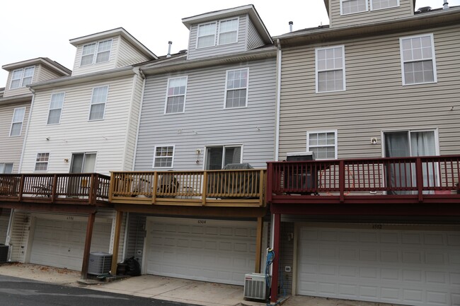 Building Photo - Available -Spacious 2 Car Garaged Townhome...