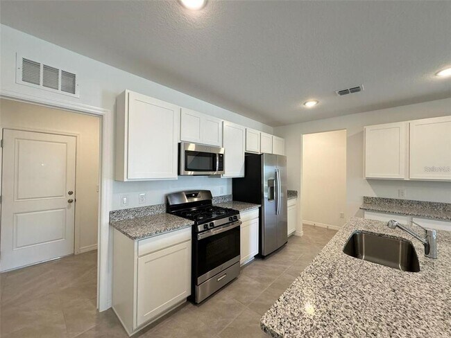 Building Photo - 15002 Windflower Aly