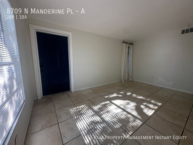 Building Photo - 8709 N Mandarine Pl
